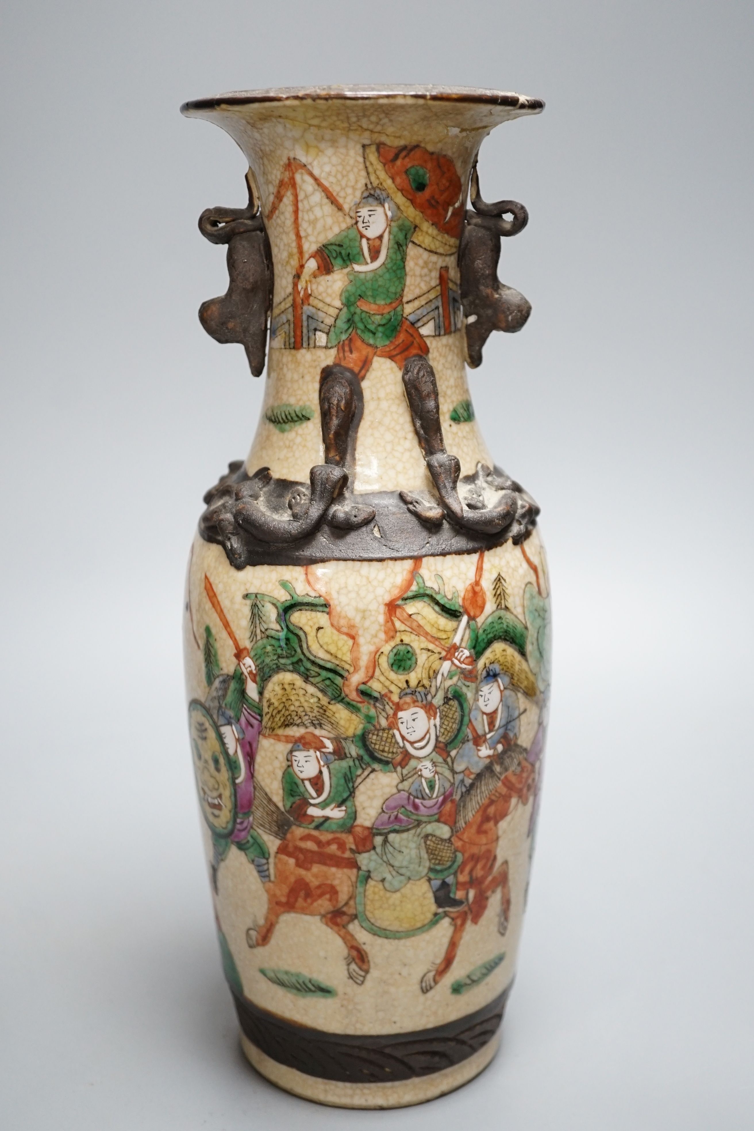 A Chinese famille rose crackleglaze vase, 29cm, together with a famille rose teapot and a crackleglaze celadon ground bottle vase